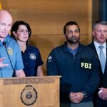 Utah Governor Spencer Cox alongside FBI Director Kash Patel at a press conference in Orem, Utah