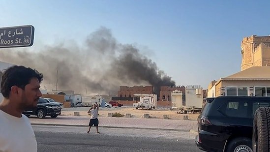 This frame grab taken from an AFPTV footage shows smoke billowing after explosions in Doha's capital Qatar on September 9, 2025. (AFP)
